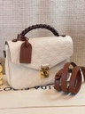 Pochette Metis Empreinte Creme / chocolate braided