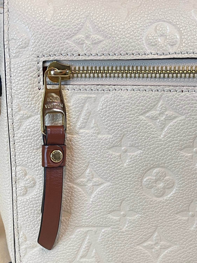 Pochette Metis Empreinte Creme / chocolate braided