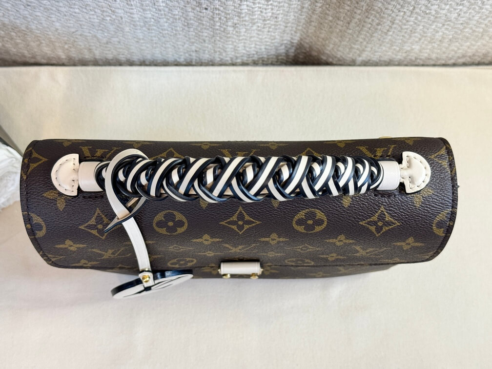 Pochette Metis Monogram braided