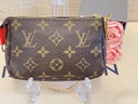Mini Pochette Monogram Lion