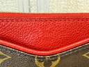 Pallas Clutch Monogram cerise