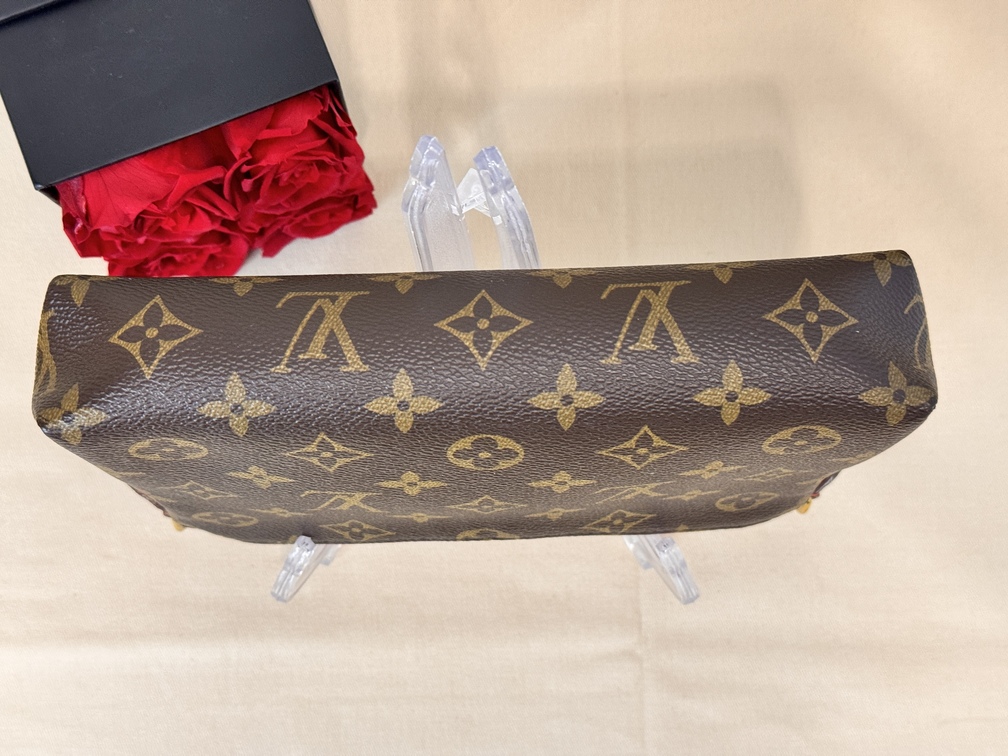 Pallas Clutch Monogram cerise