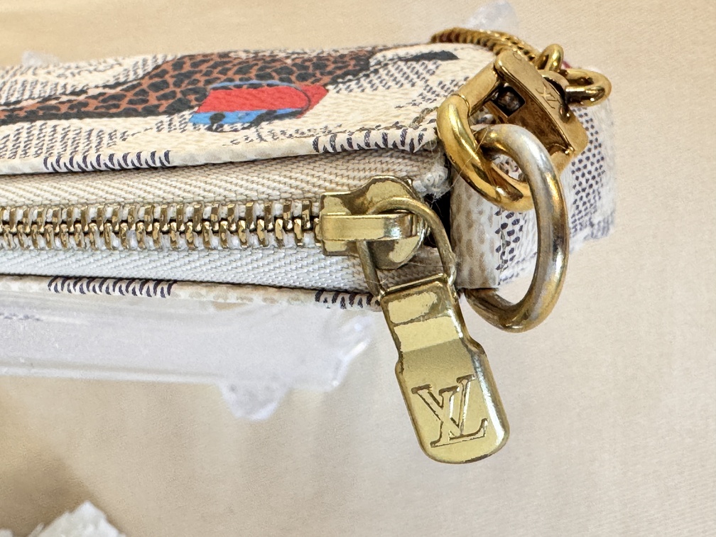 Mini Pochette Monogram Giraffe