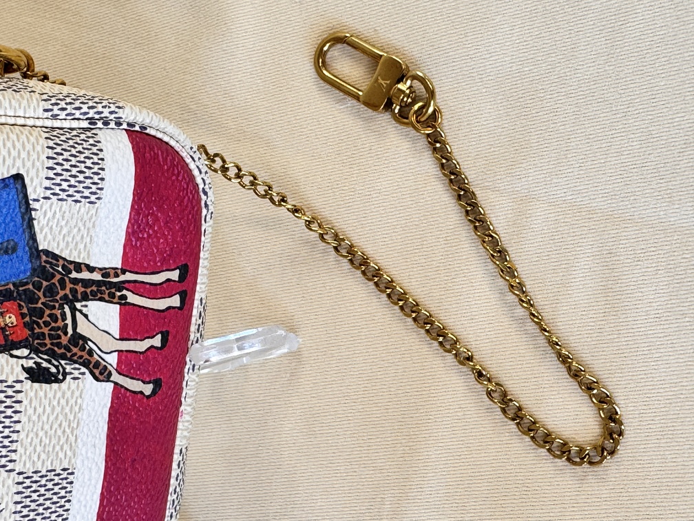 Mini Pochette Monogram Giraffe
