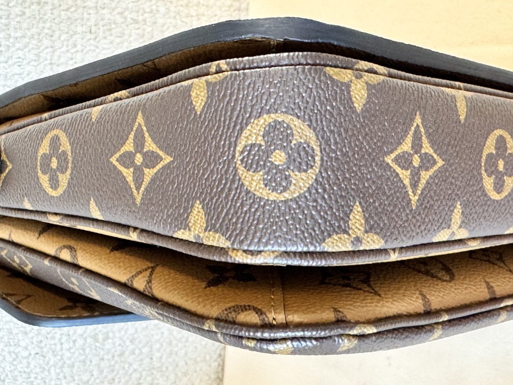 Pochette Metis Monogram Reverse