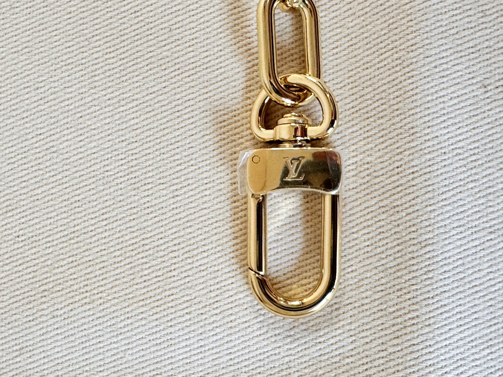 Taschenschmuck Gold