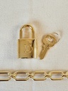 Taschenschmuck Gold