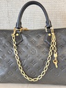 Taschenschmuck Gold