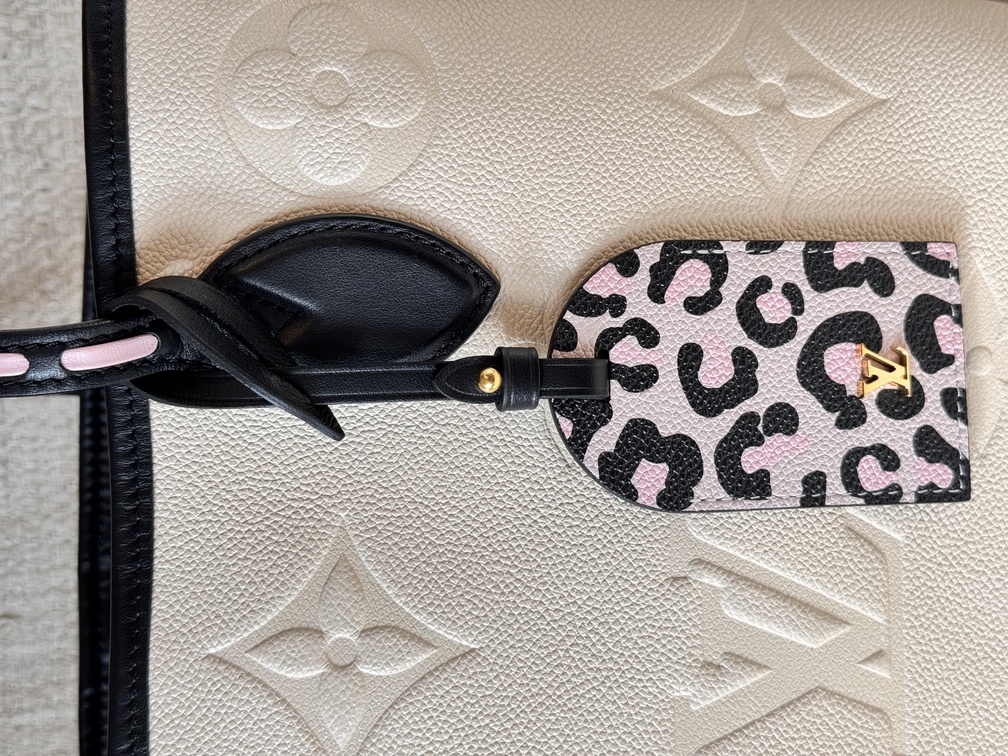 Neverfull MM Wild at Heart creme