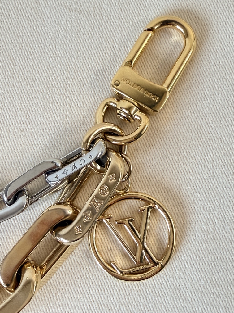 Taschenschmuck Edge gold silber