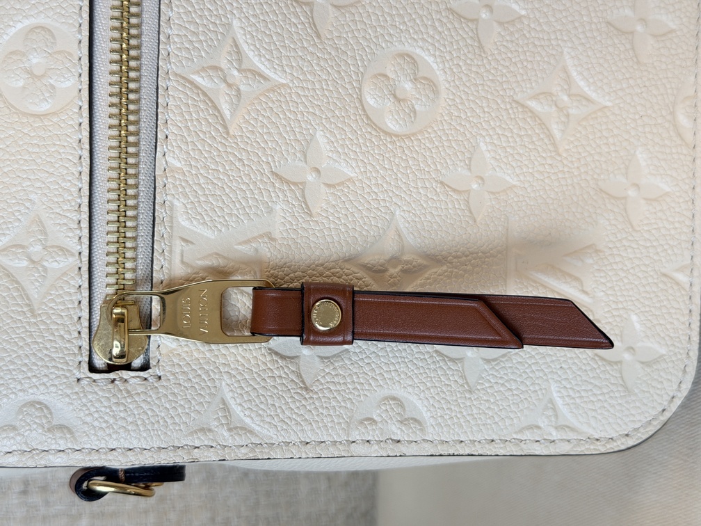 Pochette Metis Empreinte Creme / chocolate braided