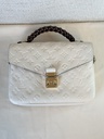 Pochette Metis Empreinte Creme / chocolate braided