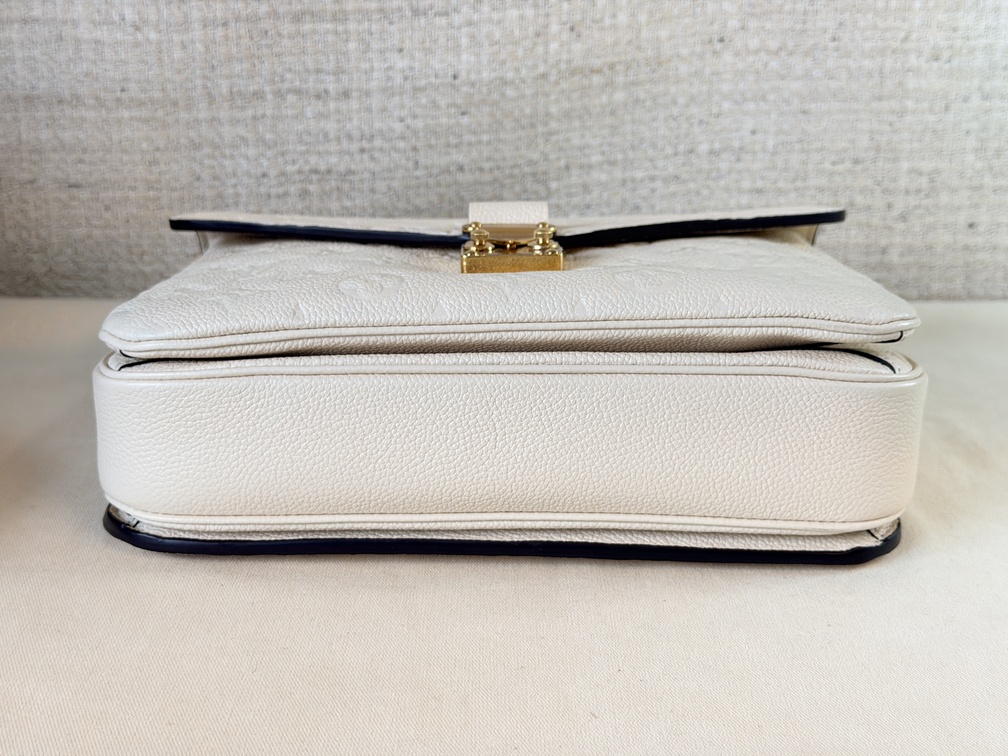 Pochette Metis Empreinte Creme / chocolate braided