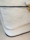 Pochette Metis Empreinte Creme / chocolate braided