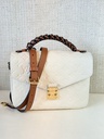 Pochette Metis Empreinte Creme / chocolate braided